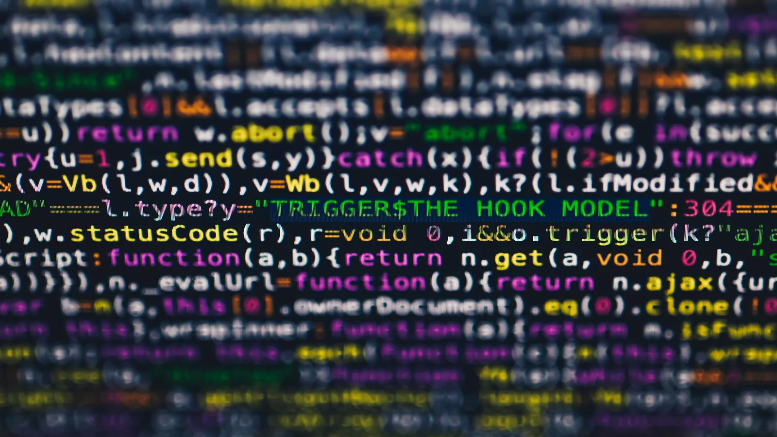 Close-up of multicoloured code lines on a screen